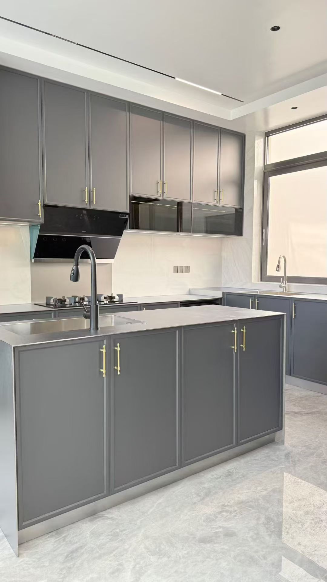 Villa kitchen with a stainless-steel island